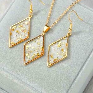 3pc. Clear geometric earring and necklace set